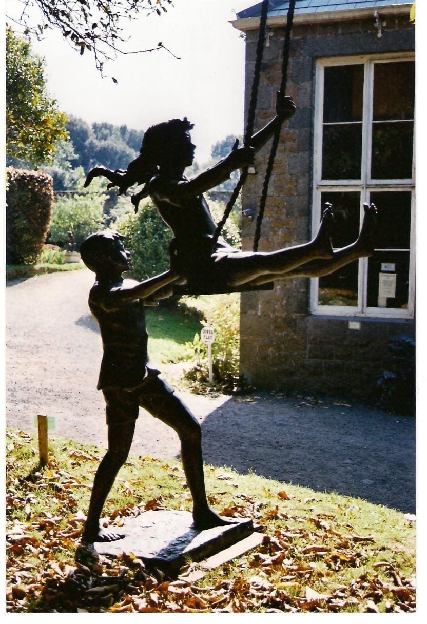 Girl on Swing (Bronze Children Playing Active statue)
