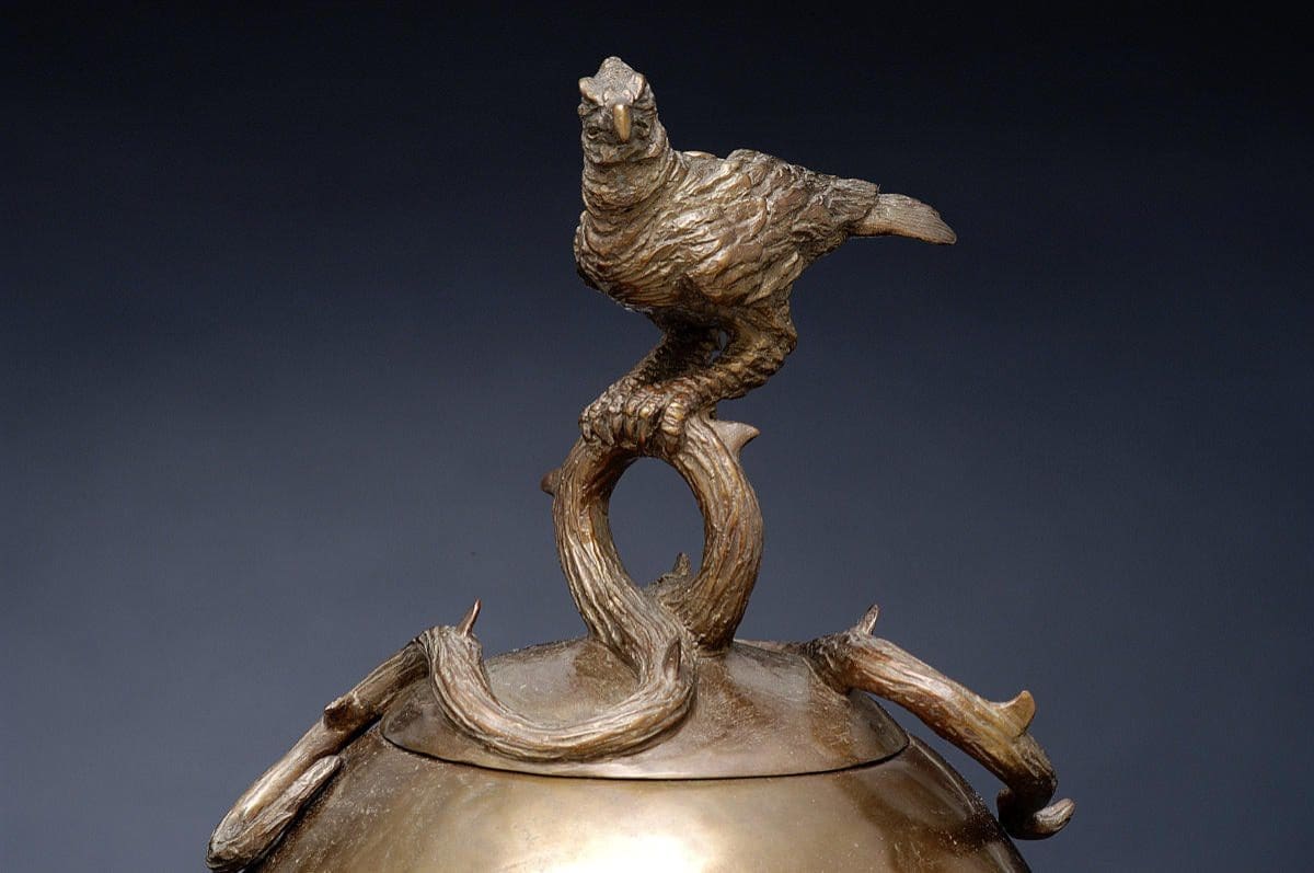 The Guardian (Globe and Bird of Prey Hawk statue)