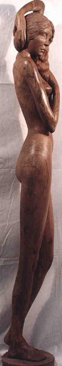 Nude and Comb (Carved Wood Torso Girl statue)
