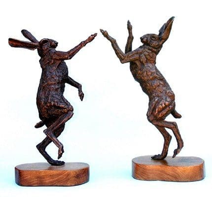 March up and March Down (Bronze Fighting Hares on a Yew Base statue)