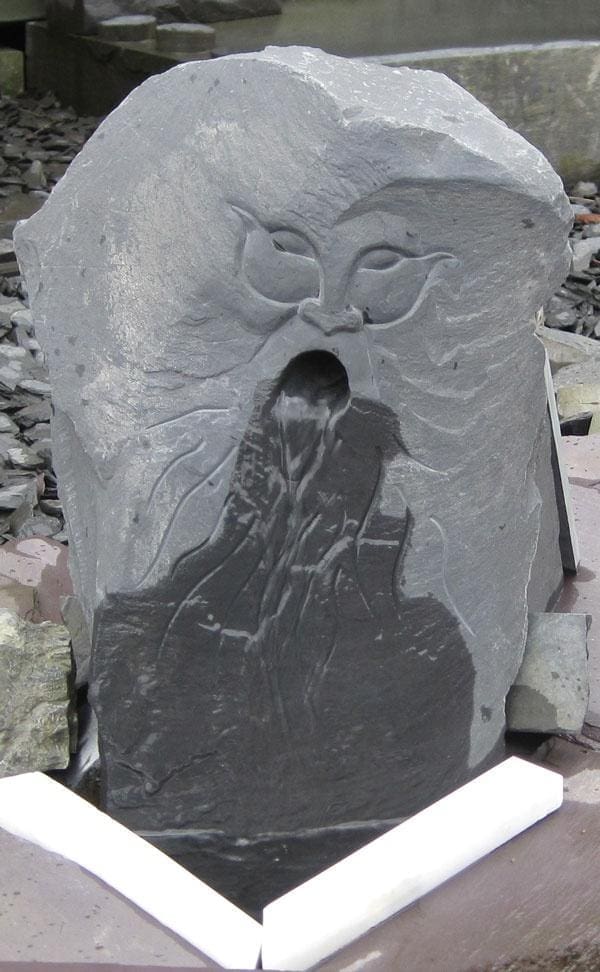 slate water feature (Green Man Wall Fountain sculptures)