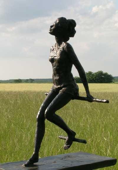 Girl on a Promenade (Small Bronze resin Sitting statue)