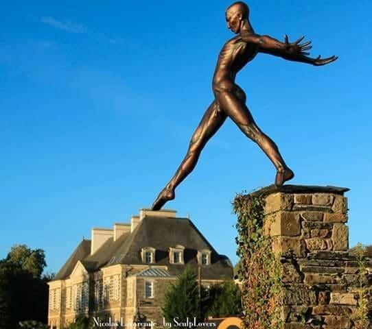 Grand Defi (Bronze Striding Man Balancing Sculpture)