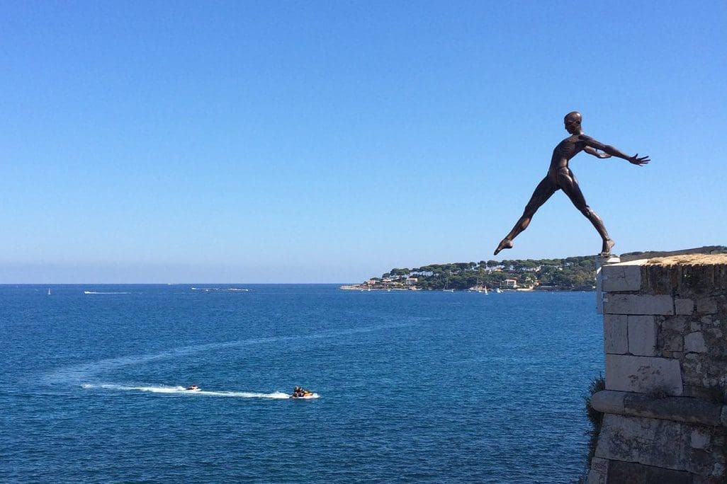 Grand Defi (Bronze Striding Man Balancing Sculpture) - Image 2