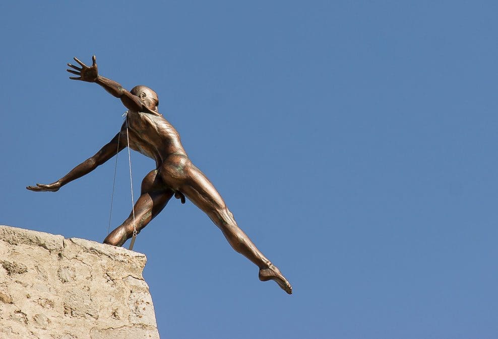Grand Defi (Bronze Striding Man Balancing Sculpture) - Image 5