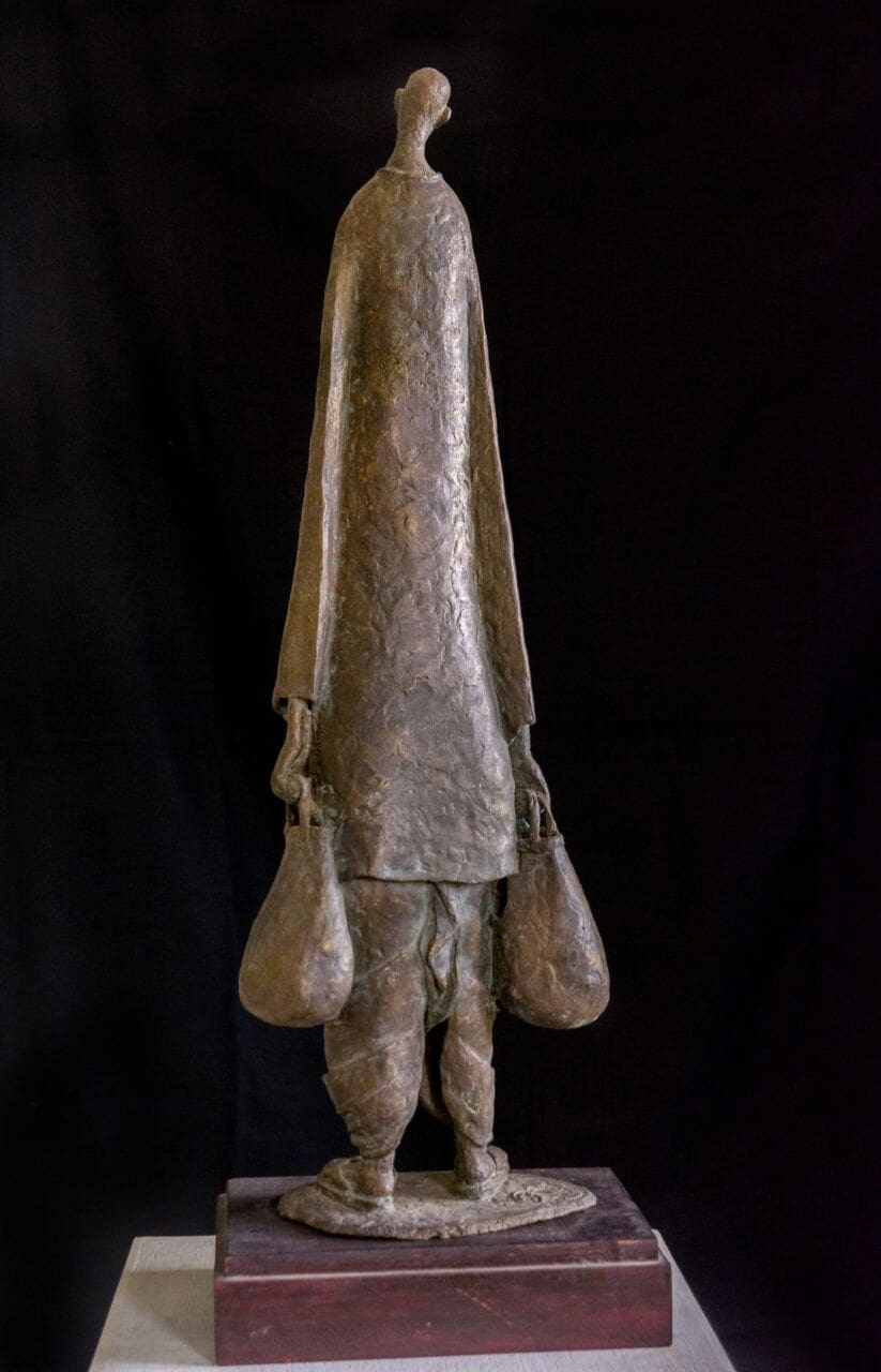 Retired (Small Bronze Abstract Woman with Bags statue)