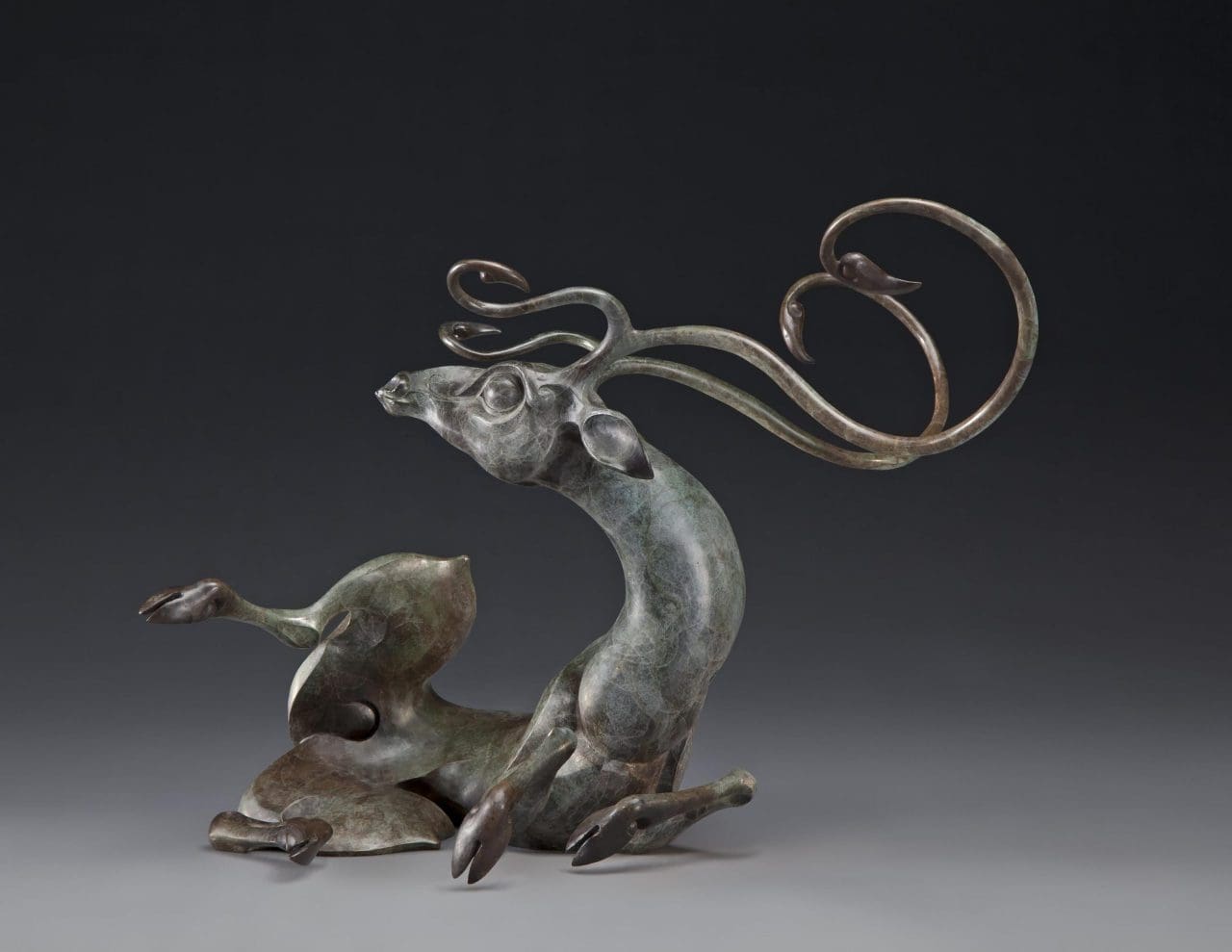 Awakening Buck (Abstract Young Buck Deer Bronze statuette)