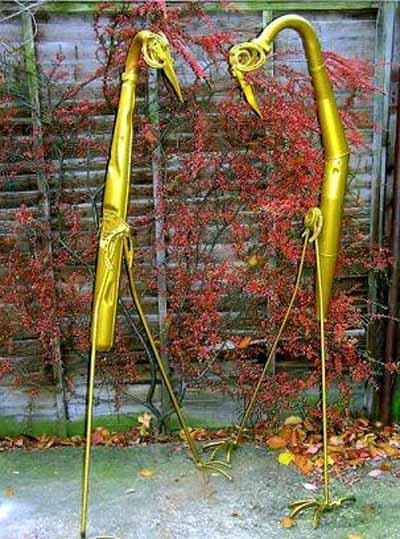 Bronze sculpture Pair of Chatting Birds by Alan Jack – two small birds perched in conversation.