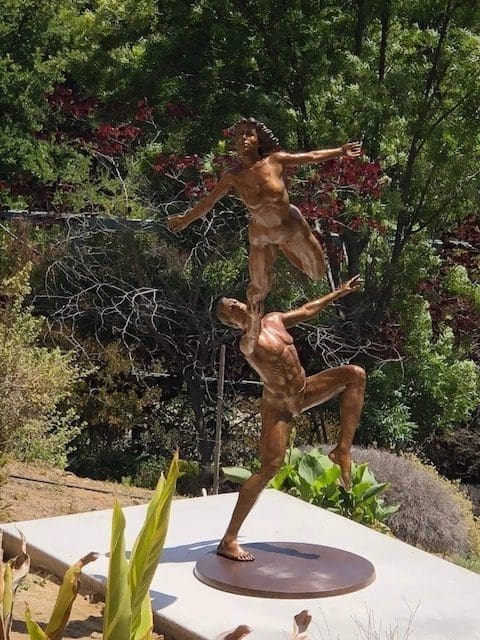Large bronze figurative sculpture Leap of Faith II by Andrew Benyei