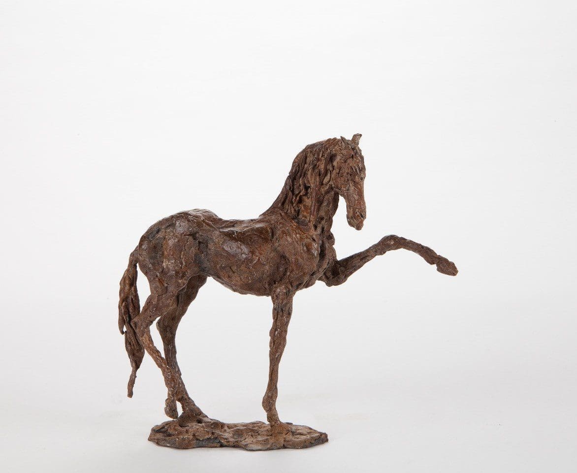Bronze stallion horse sculpture by Ans Zondag in dynamic paso doble pose