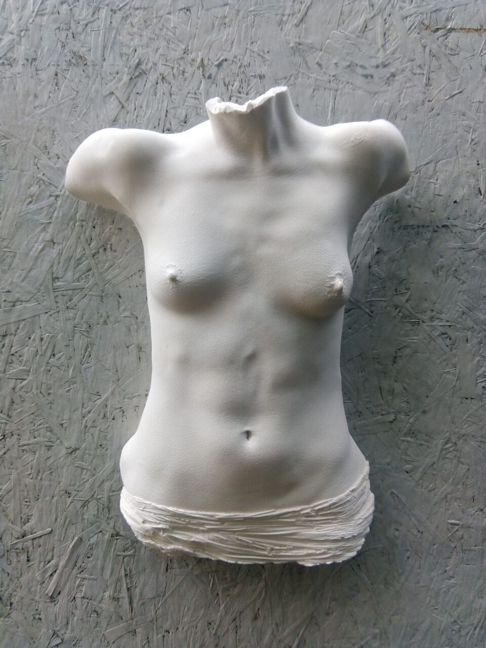 Eva resin female torso wall sculpture by Anthony Jeffries