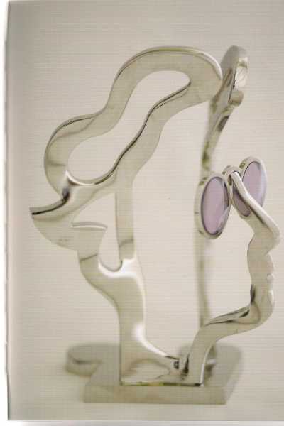 Abstract bronze and mixed media sculpture titled Imagine inspired by John Lennon by Guy Portelli