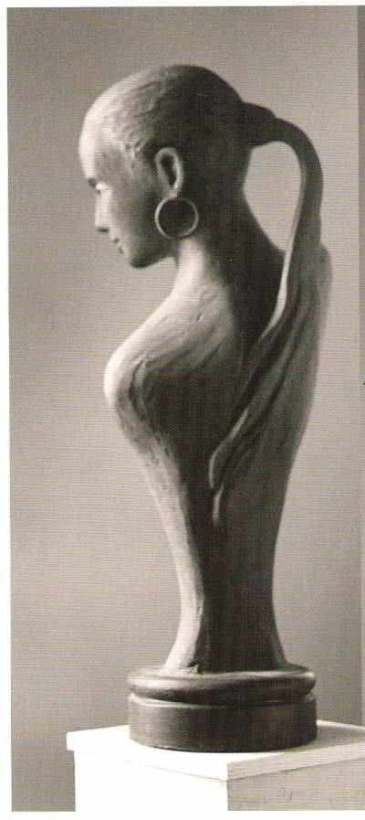 Bronze bust sculpture “Taboo” by Guy Portelli, portraying the musician Sade with elegance and poise.