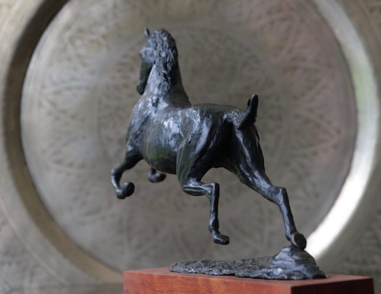 Bronze sculpture of a rearing horse by Jonathan Parkinson.