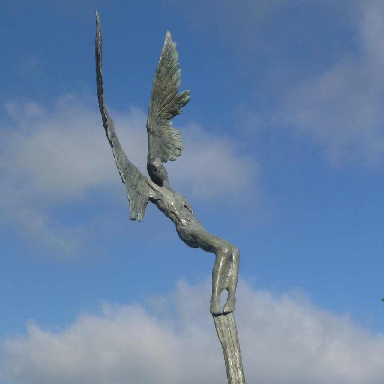 Large bronze sculpture of a flying boy Icarus by Nicola Godden