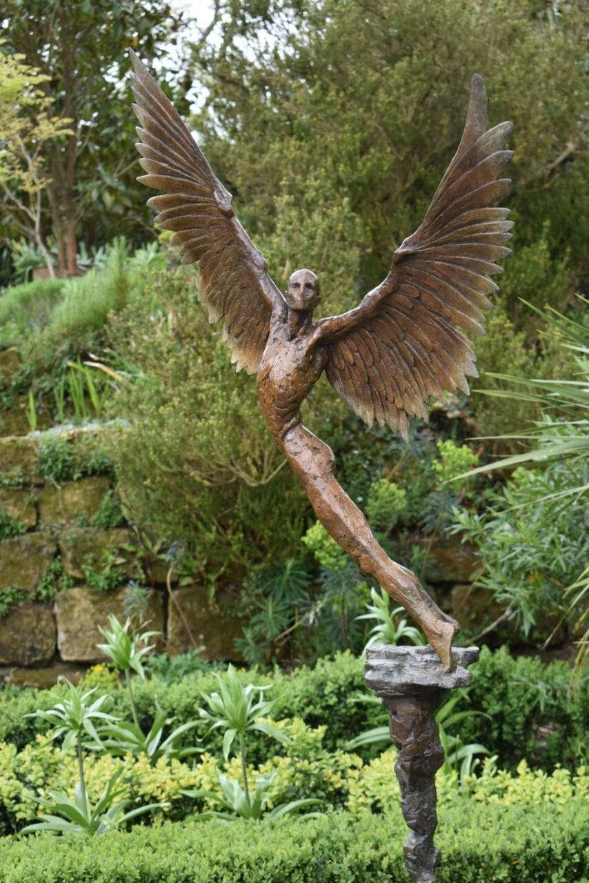 Bronze Icarus sculpture by Nicola Godden with wings outstretched in flight