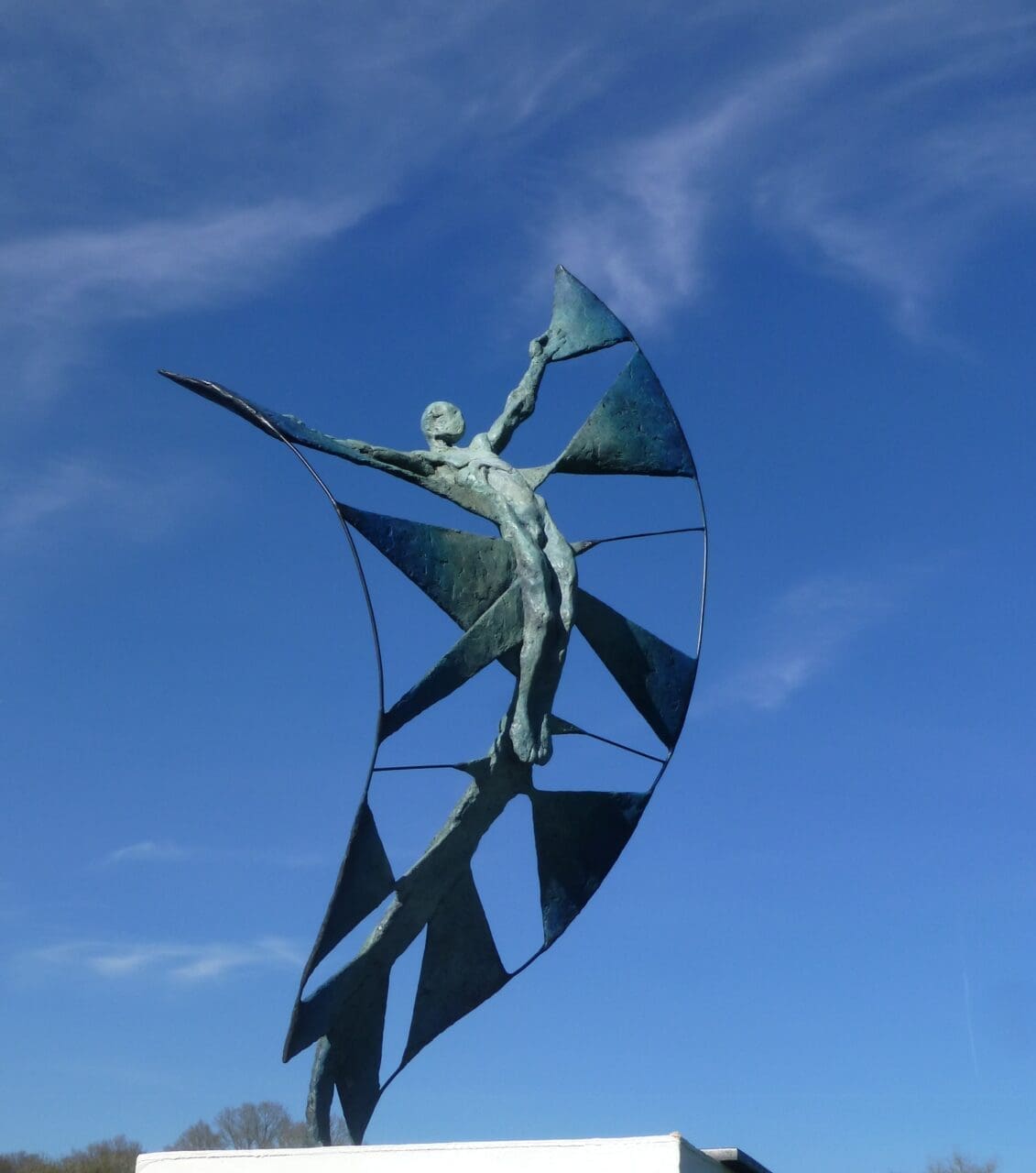 Bronze abstract nude youth sculpture by Nicola Godden expressing movement and freedom