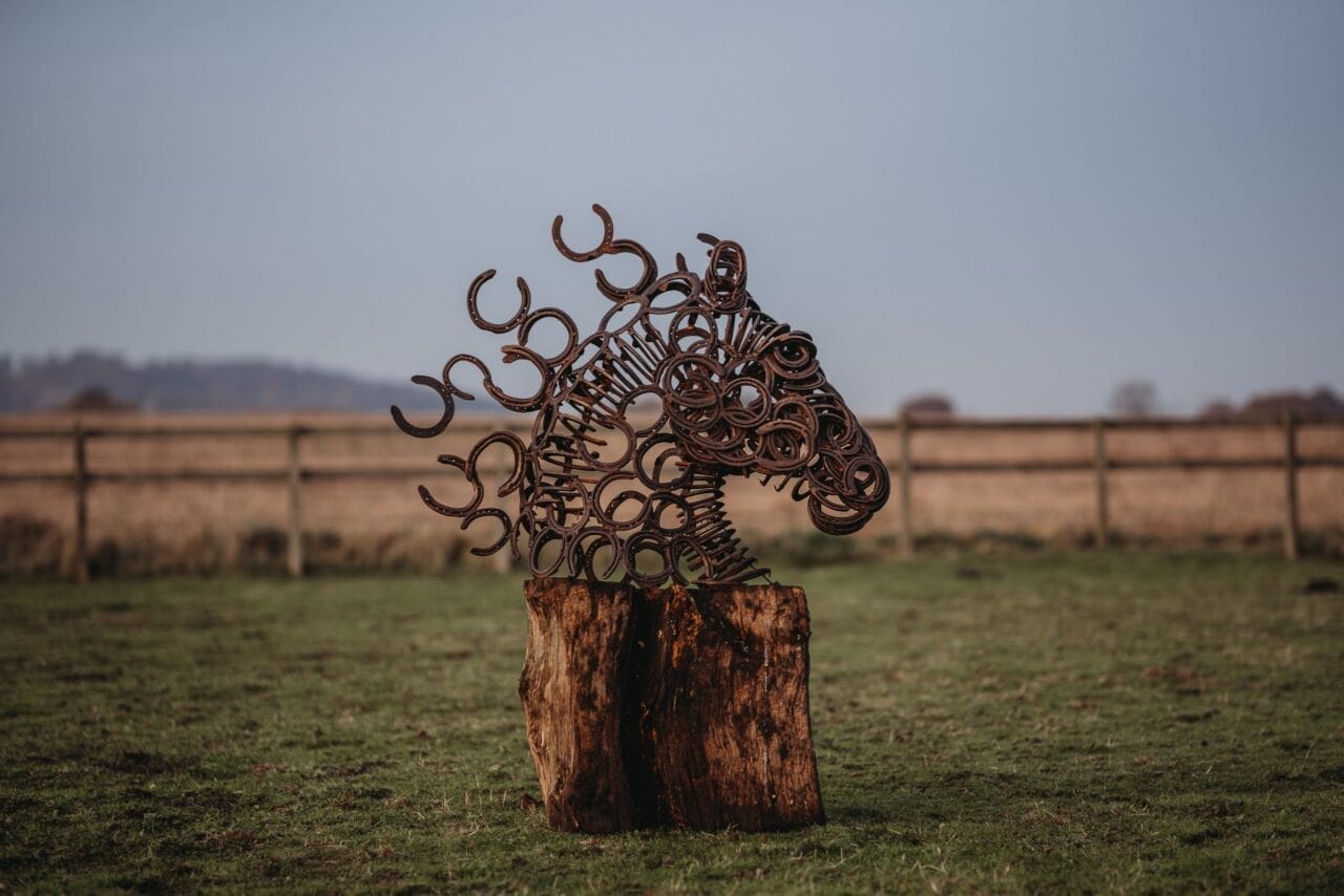 Trojan horse head sculpture made from horseshoes steel by Ollie Holman