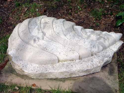 Ceramic sculpture “Ocean Cone” by Paul Wilson – abstract marine form.