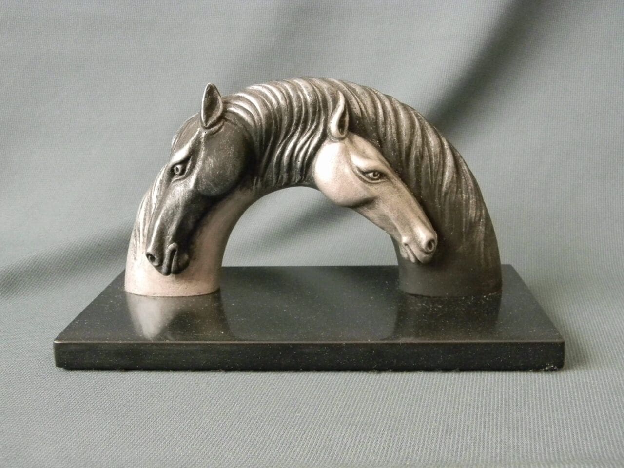 Stylised horse bust sculpture The Ouroboros of Love by Pavel Zhukovsky