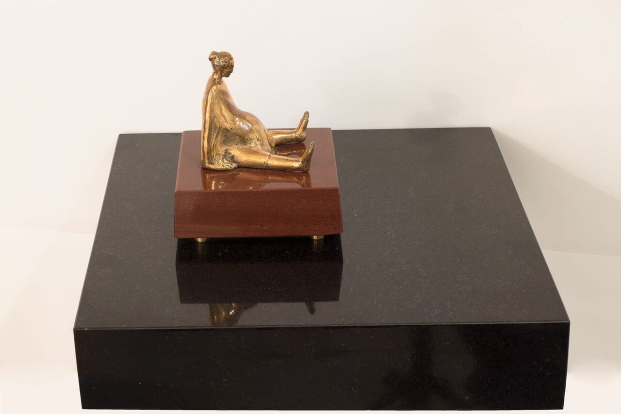 Bronze seated pregnant female sculpture The Quadership by Stasys Zirgulis