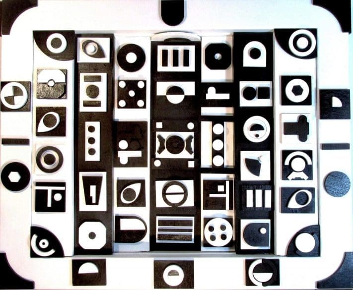 Abstract yin and yang wall sculpture in wood by Perryn Butler.