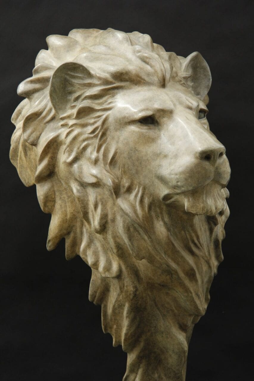 Life-size bronze lion mask wall sculpture by Gill Parker