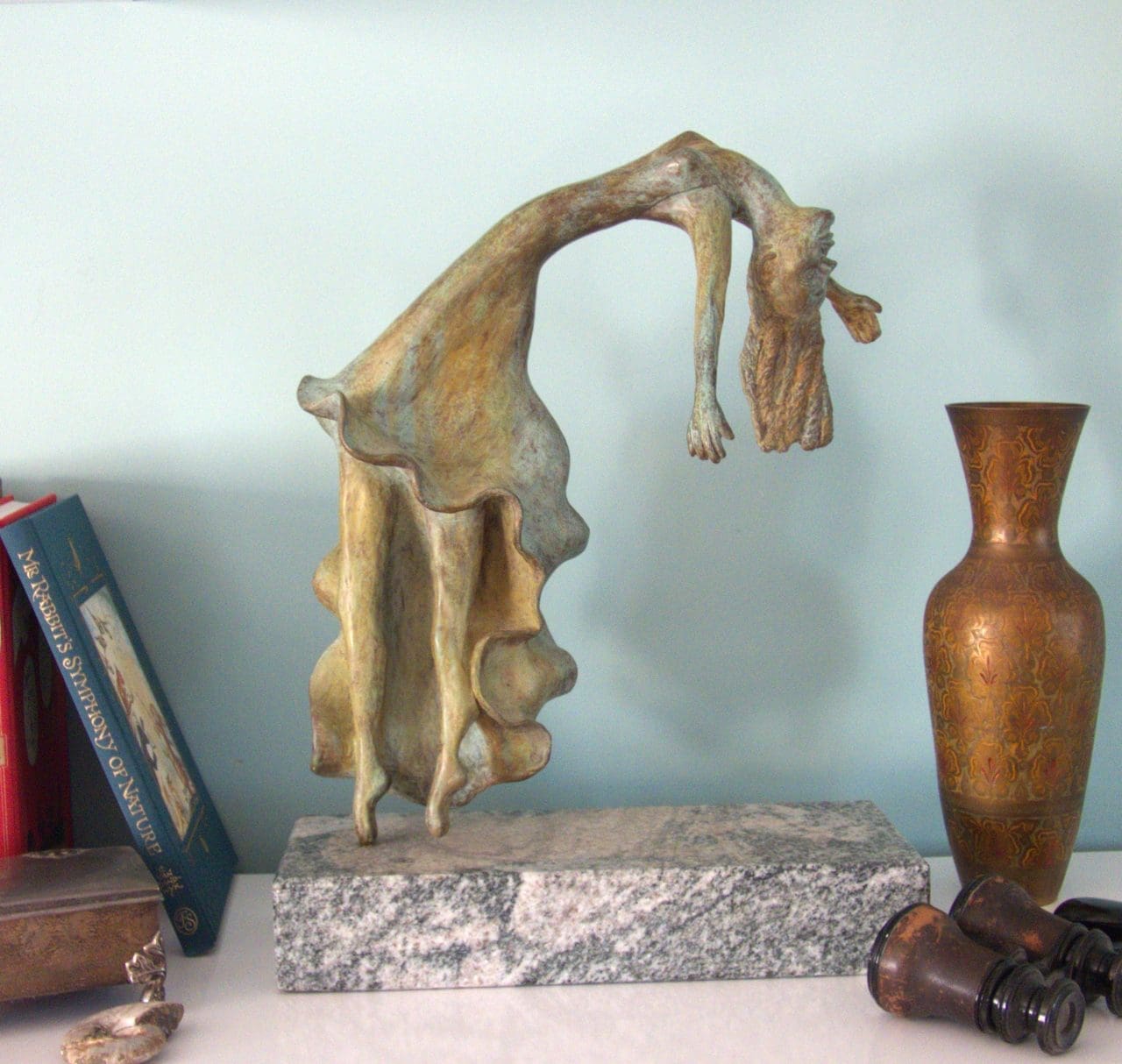 Bronze sculpture “Dancer” by Zita Abreu, depicting fluid movement in contemporary form.