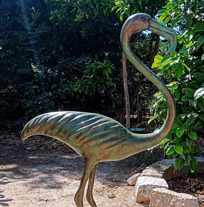 Bronze flamingo bird sculpture by Zita Abreu for garden display