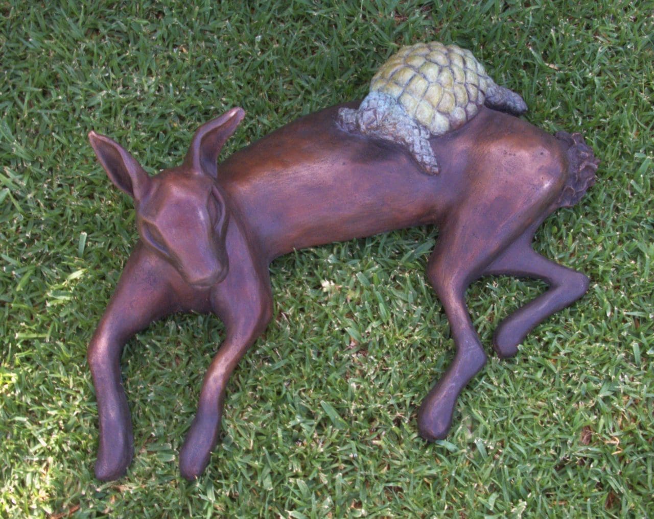 Bronze hare and tortoise sculpture by Zita Abreu inspired by classic fable