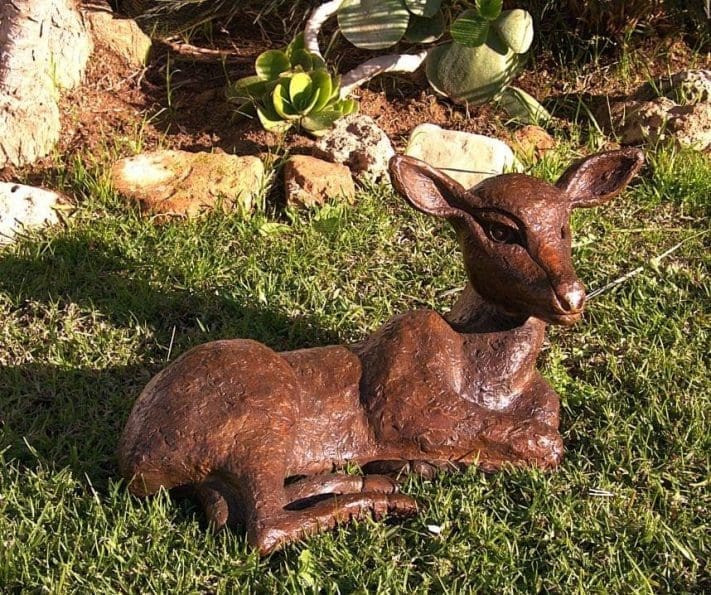 Bronze sculpture of a red deer fawn by Zita Abreu, capturing the natural grace and innocence of wildlife in a contemporary form.
