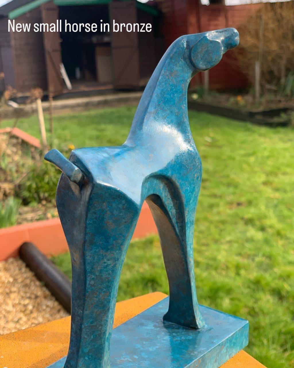 Small blue-patinated bronze horse sculpture by Marie Ackers.
