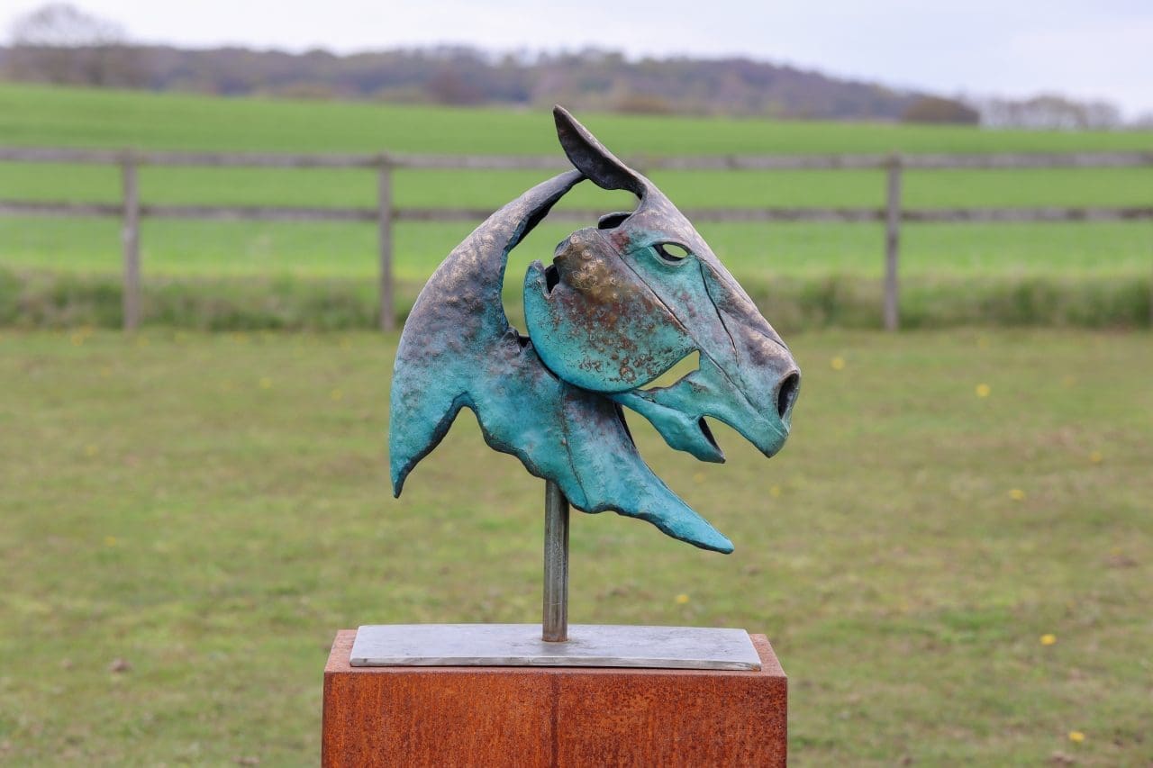 Bronze horse head sculpture by Ollie Holman with dynamic flaring detail.