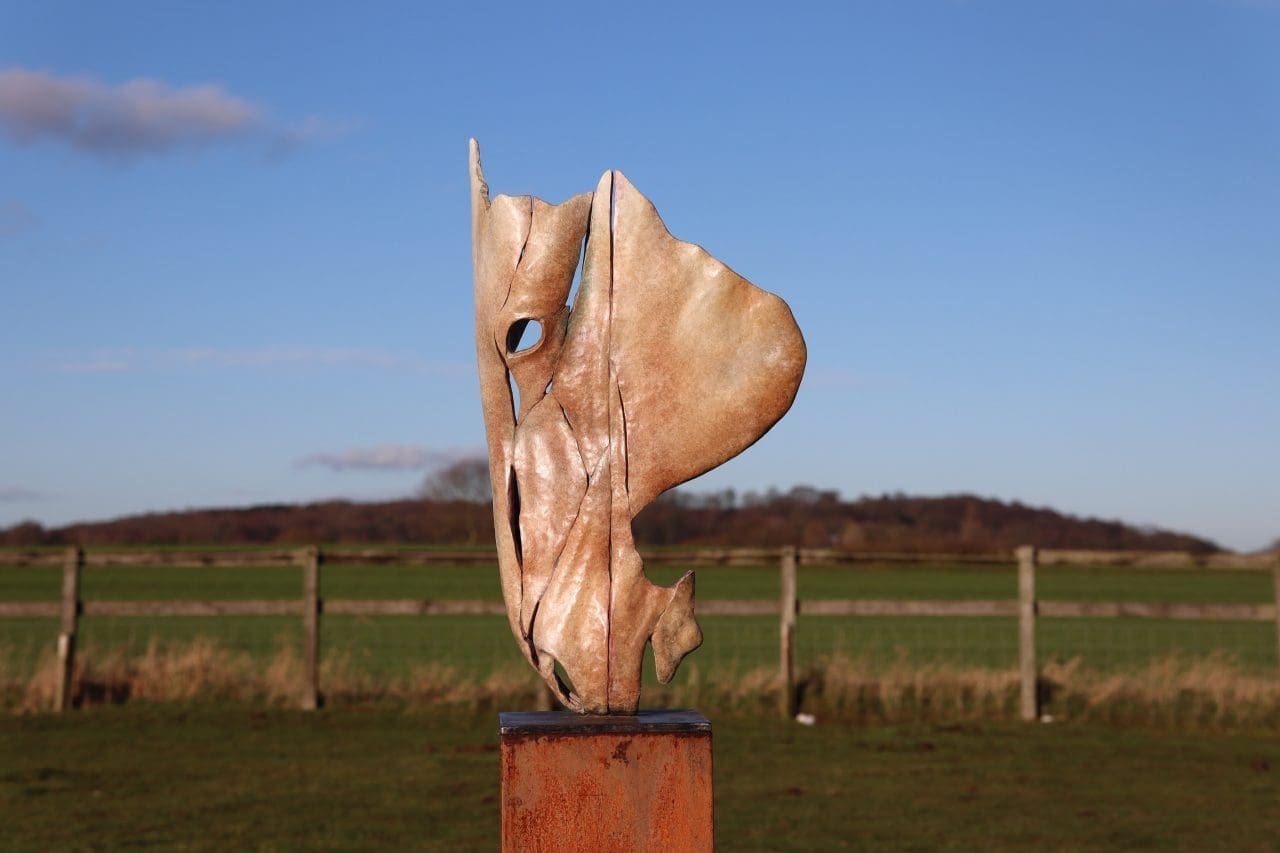 Bronze horse sculpture by Ollie Holman with elegant, flowing form titled Grace.