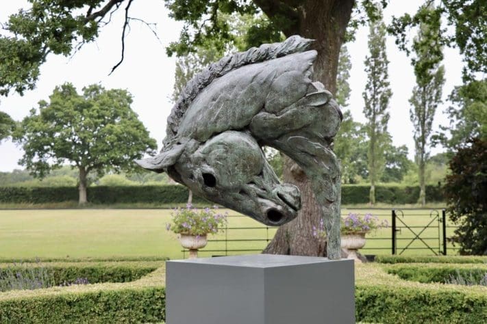 Large bronze Etruscan-style horse head sculpture by Edward Waites.