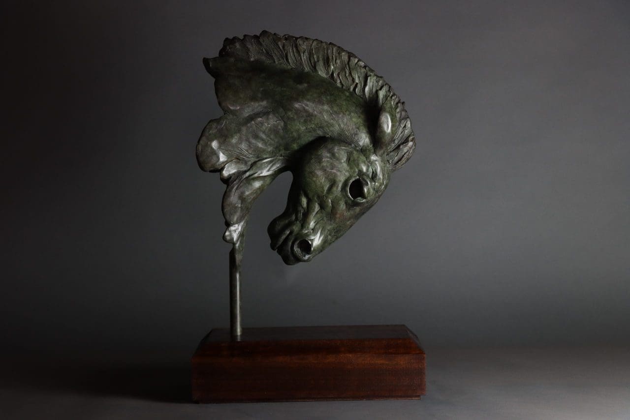 Bronze warrior horse head sculpture by Edward Waites, strong stylised equine form.