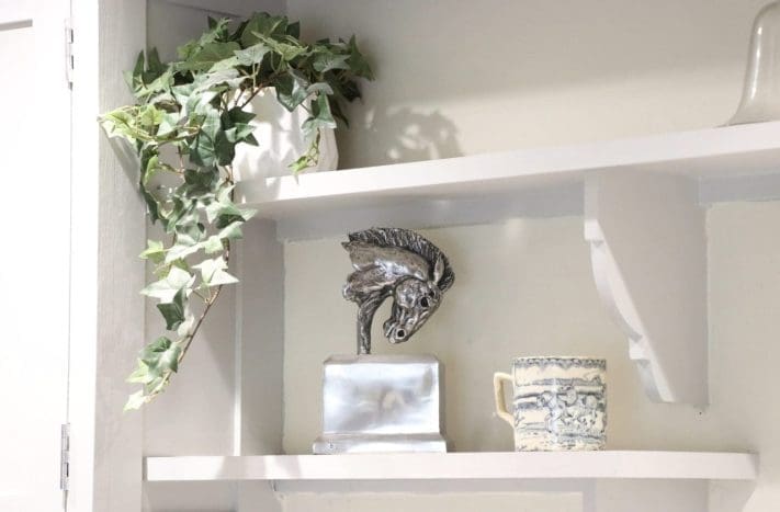 Stainless steel warrior horse head maquette by Edward Waites, modern angular equine sculpture.