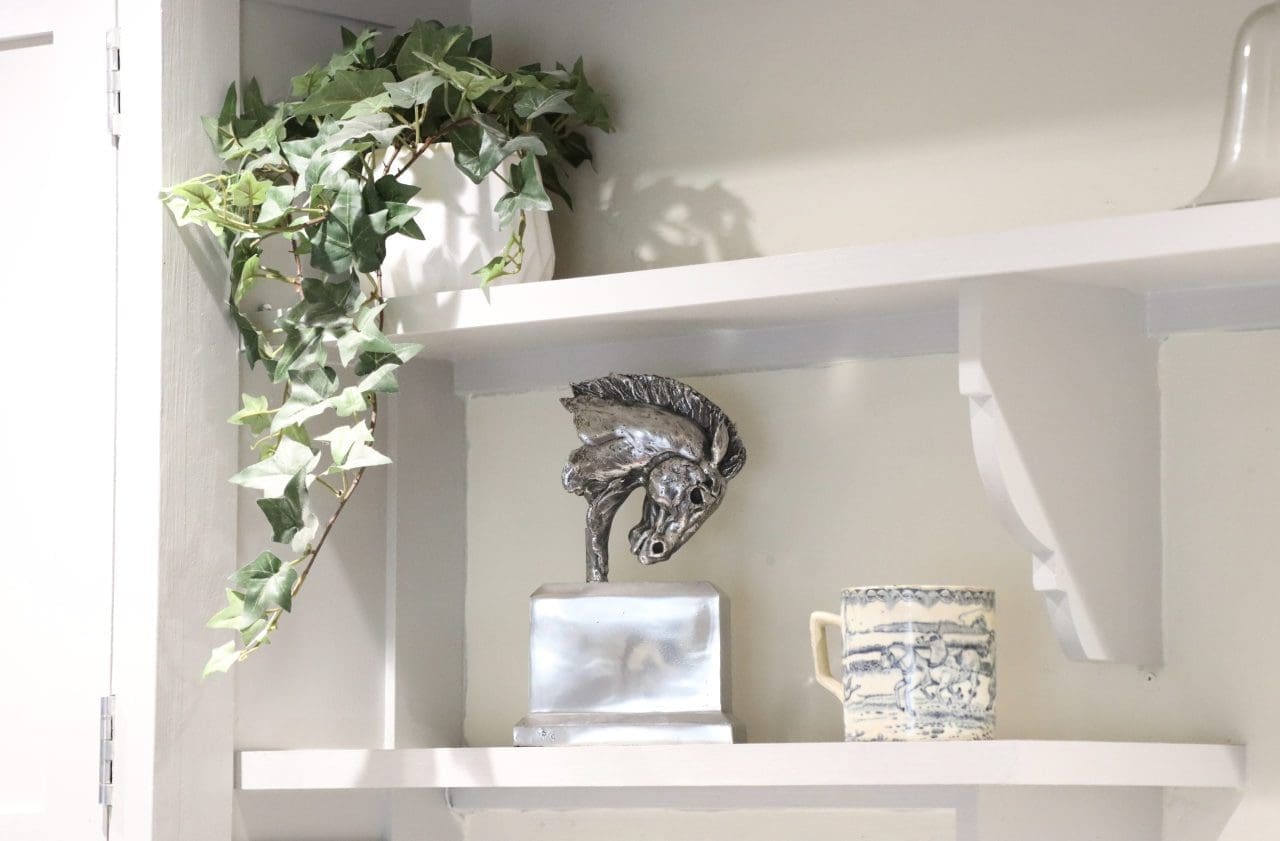 Stainless steel warrior horse head maquette by Edward Waites, modern angular equine sculpture.