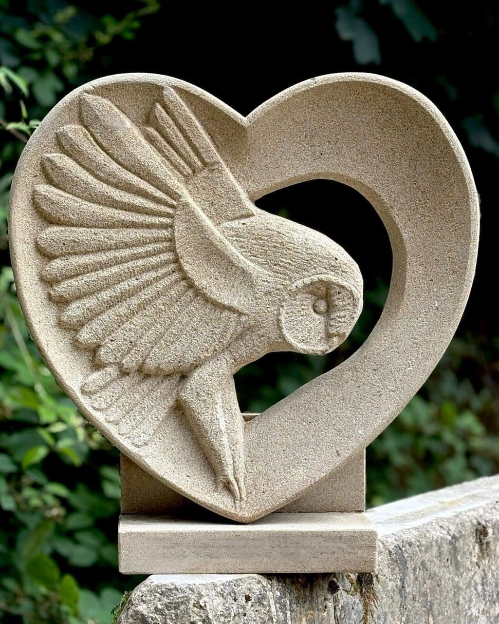 Owl In the Heart sandstone owl garden sculpture by Stephen Nicholson
