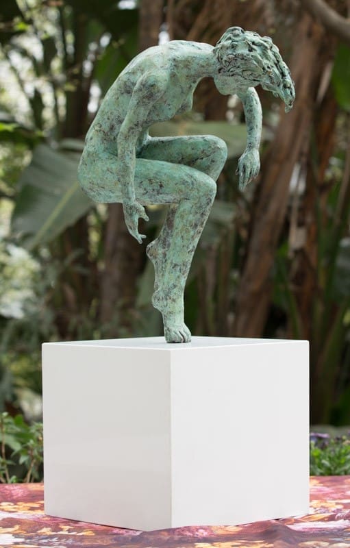 Bronze figurative sculpture “Momentum” by Heidi Hadaway