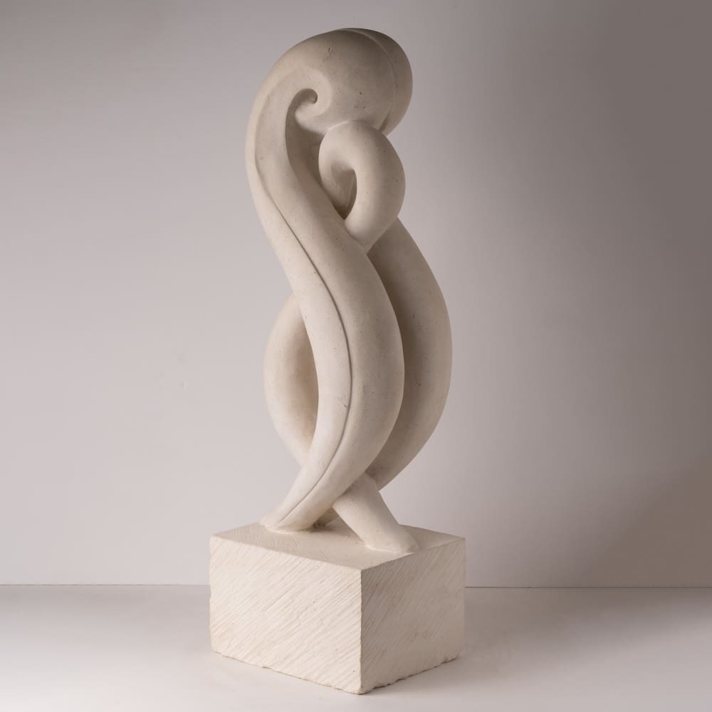 Limestone figurative sculpture representing family bond by Carrie Horwood