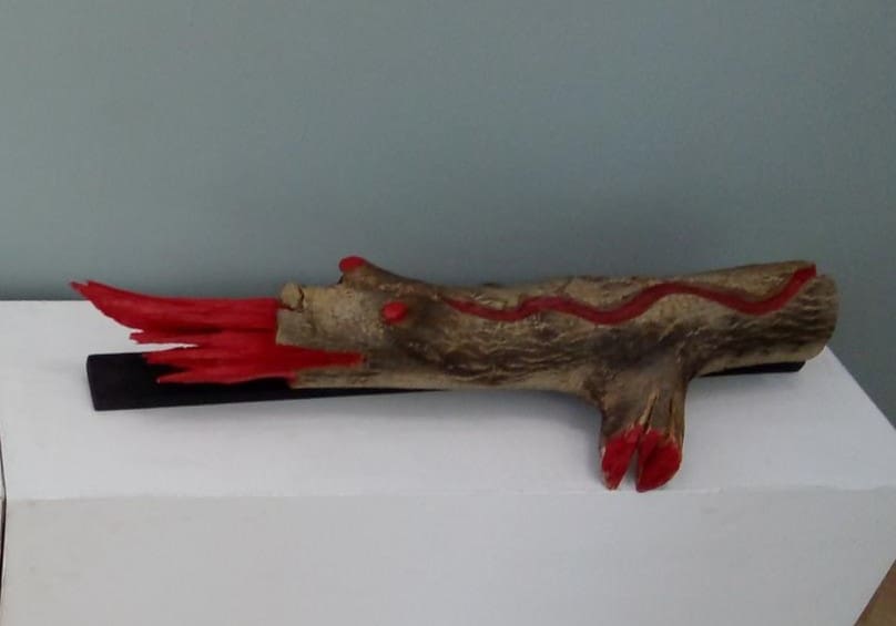 Abstract wood sculpture “Conflict II” with red accents by Tania Ivanova Tzanova