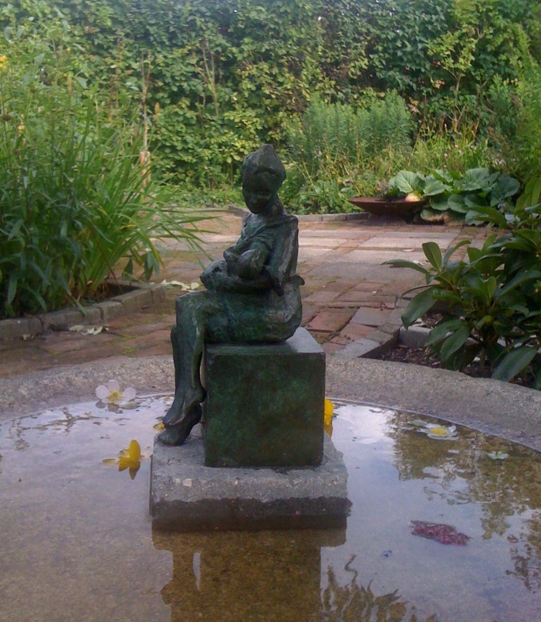 Bronze mother and child sculpture by Helle Rask Crawford