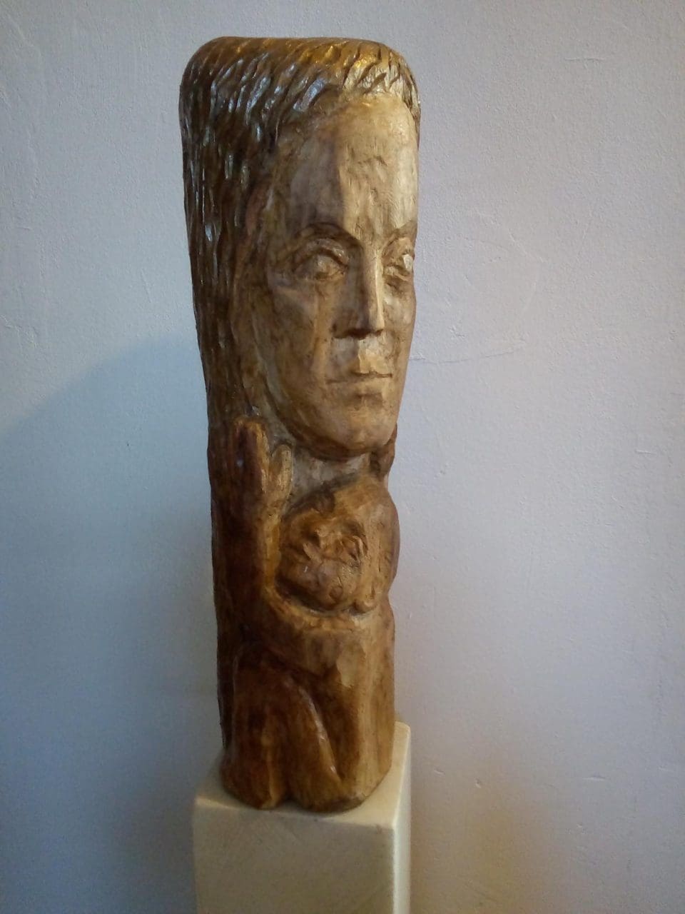 Wood carved mother and child sculpture by Tania Ivanova Tzanova