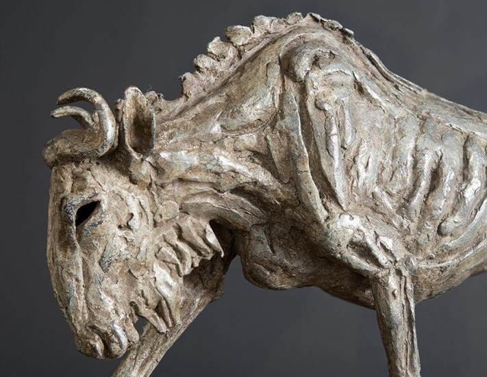 Bronze wildebeest sculpture “Onward Bound” by Jan Sweeney