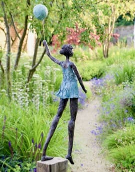 Treading Lightly (Girl in Blue Dress and Balloon Sculpture)