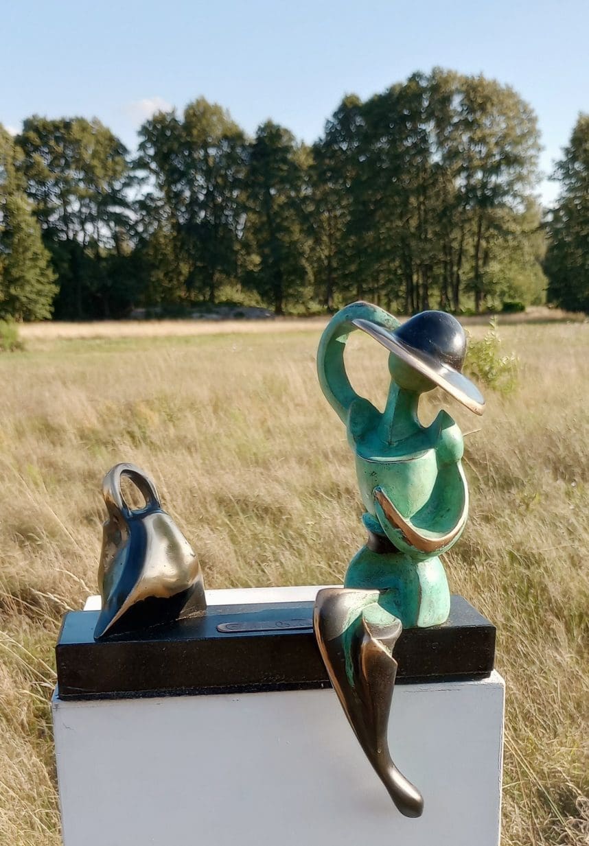 Lady in a Hat (Small Bronze Sitting Female Sculpture)